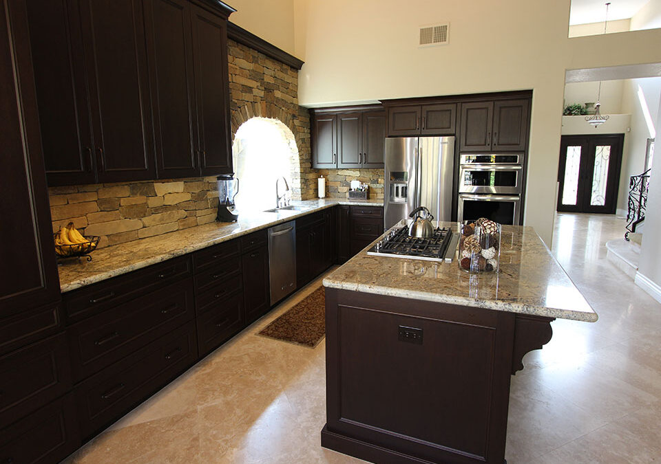 Yorba Linda Traditional Dark Brown L-Shaped Kitchen Remodel with Stone Brick Backsplash